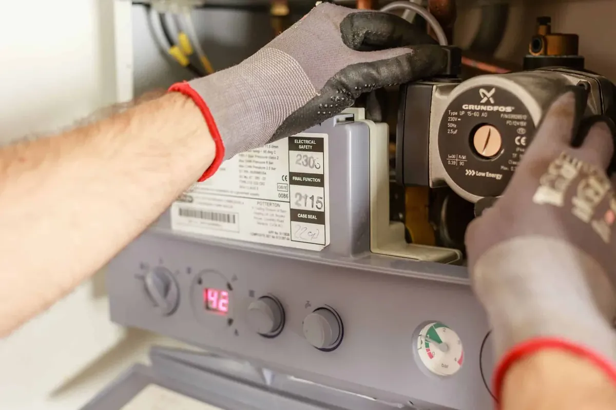 Smart Home Air & Heat technician performing heating maintenance in Orlando, FL