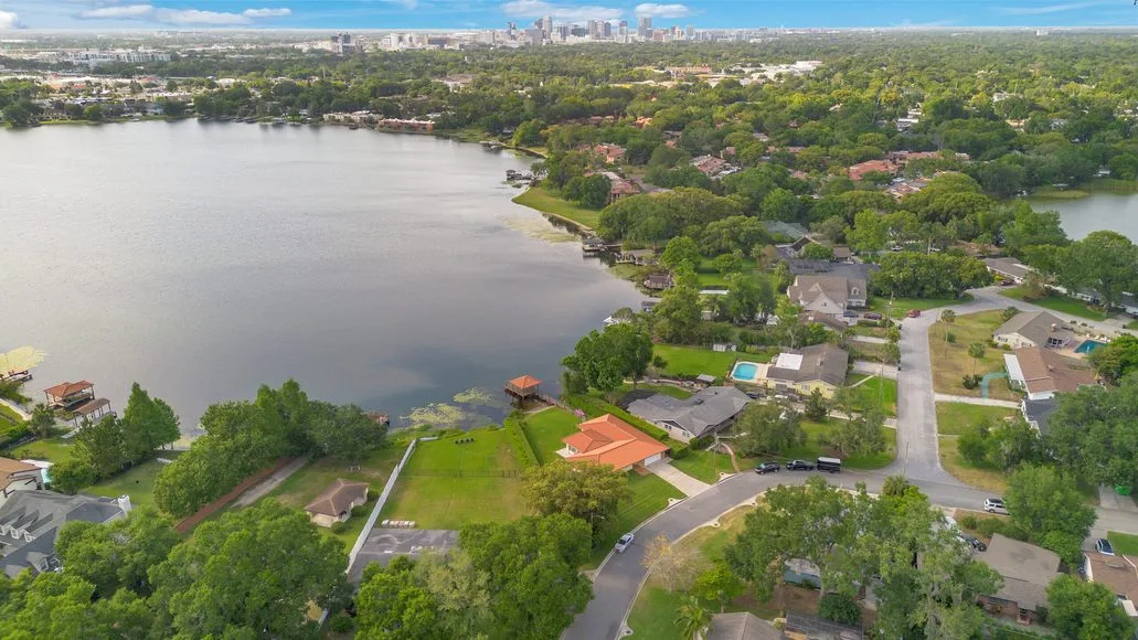 Lake Conway aerial view with Orlando skyline background 32812