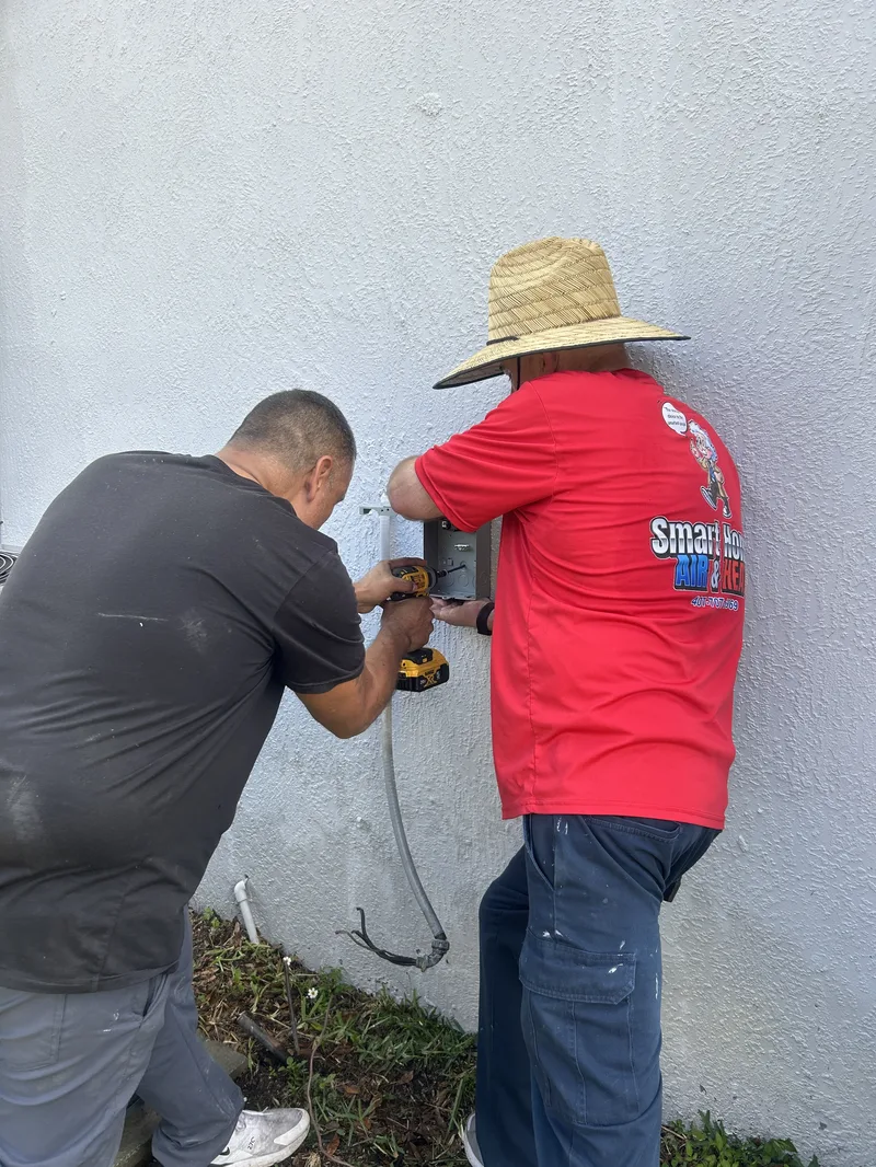 Smart Home Air & Heat technicians arriving for AC repair in East Orlando